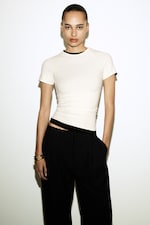 Placeholder for: woman in slim fit white t-shirt
