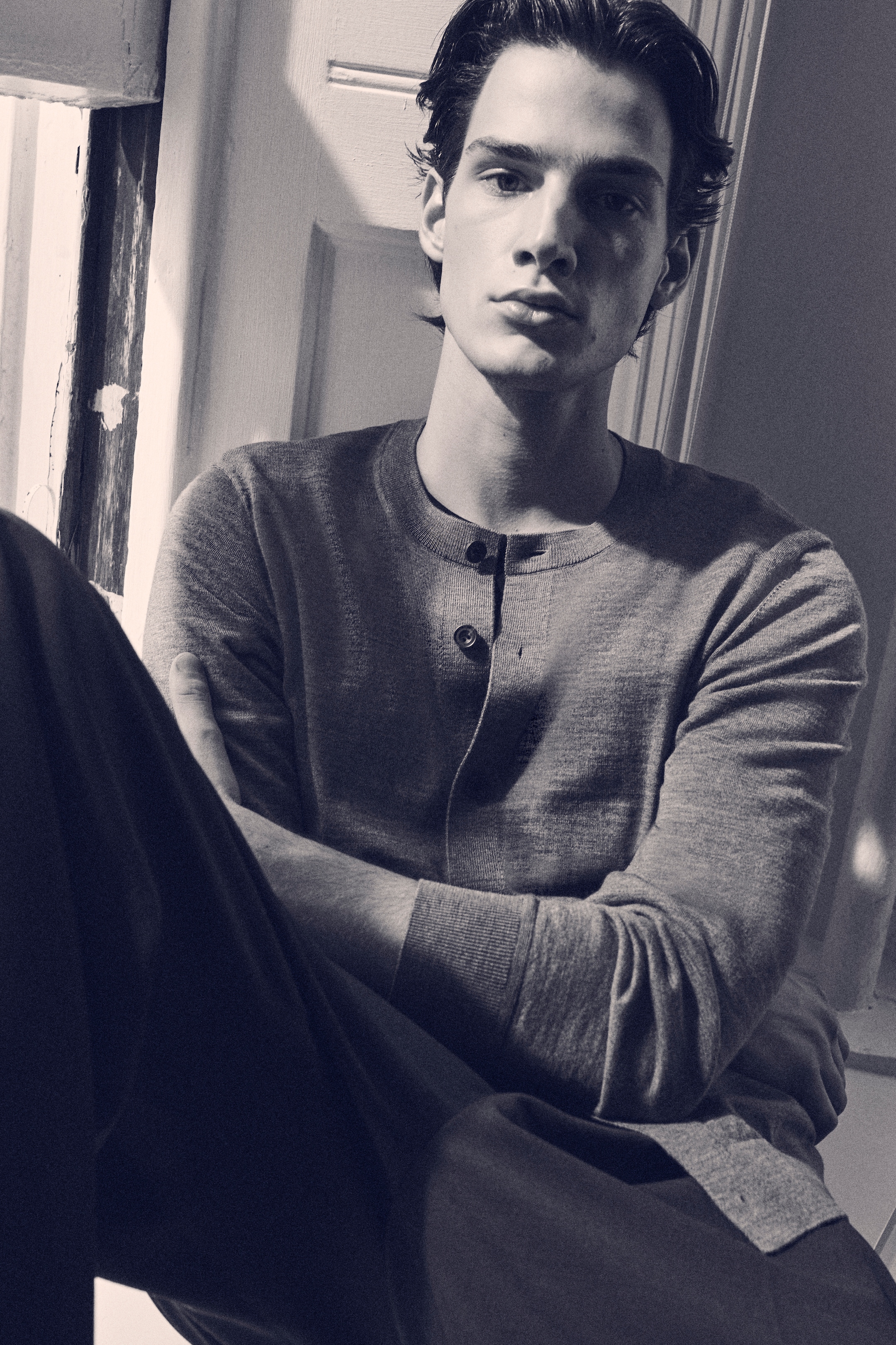 person wearing knitwear