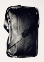 Placeholder for: Black leather bag
