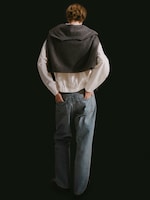 Placeholder for: Women in white shirt and jeans