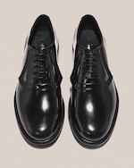 Placeholder for: Black loafers