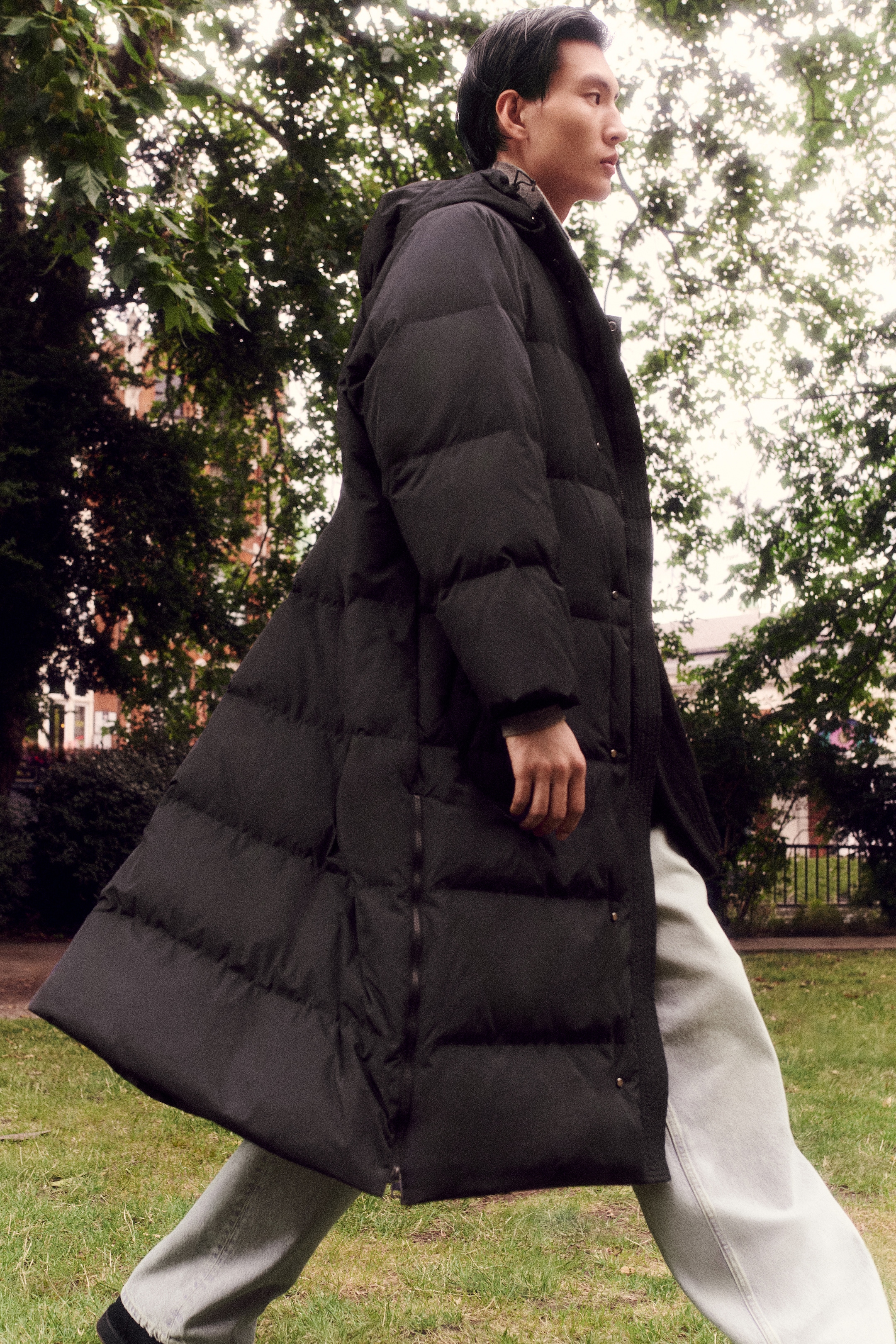 man in long puffer coat