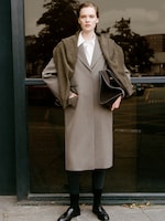 Placeholder for: Women in suit and bag