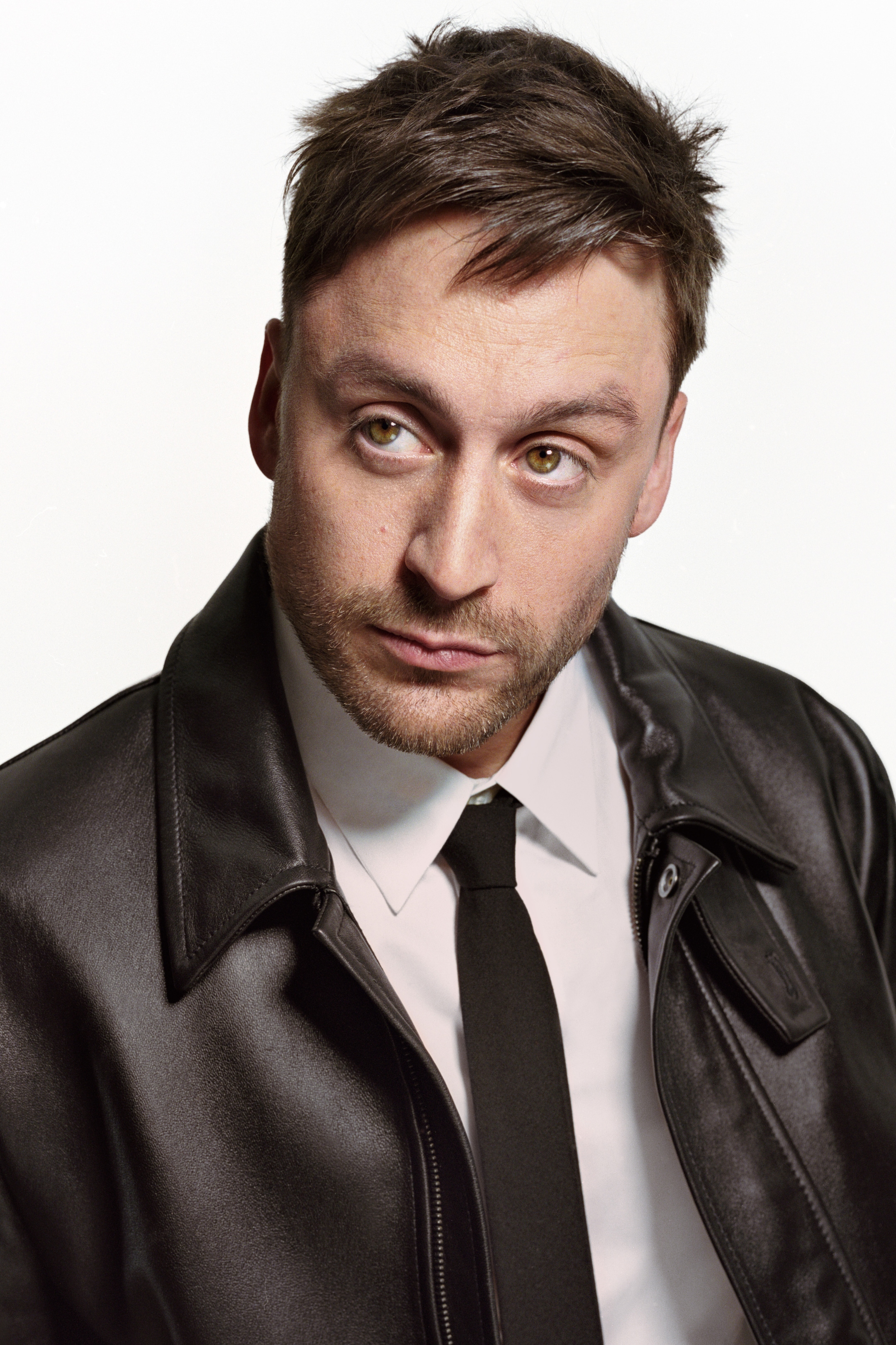 person wearing leather jacket