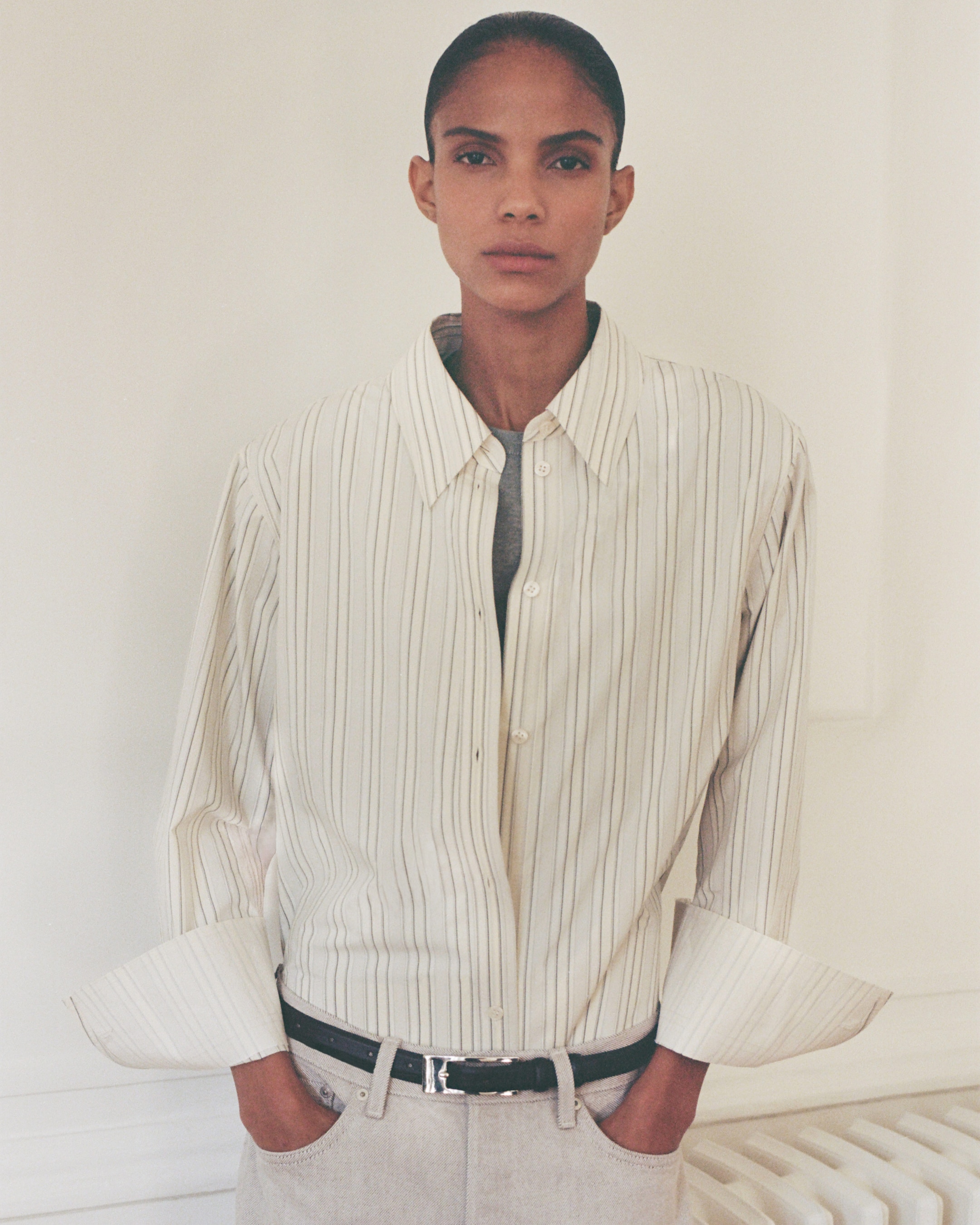 model wearing beige shirt