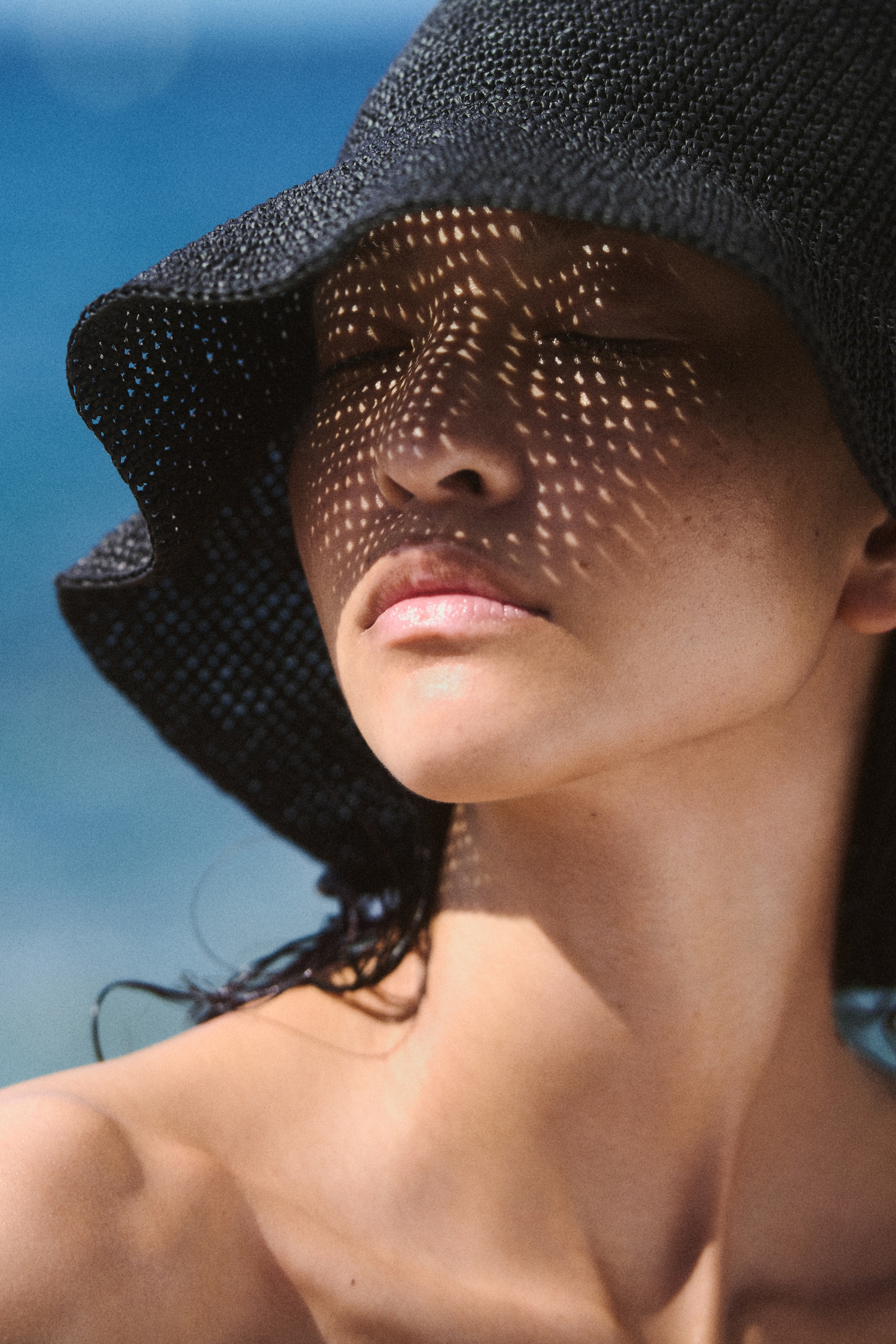 woman in straw hat