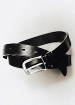 Placeholder for: A black leather belt with a silver buckle coiled on a light background.