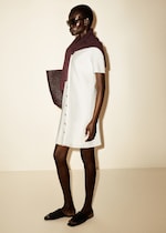 Placeholder for: woman in white knitted mini dress