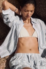 Placeholder for: woman in stripe shirt