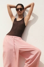 Placeholder for: woman in pink trousers