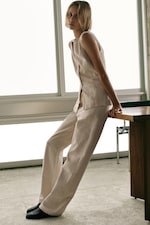 Placeholder for: Woman in beige denim set