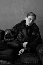 Placeholder for: woman in black coat