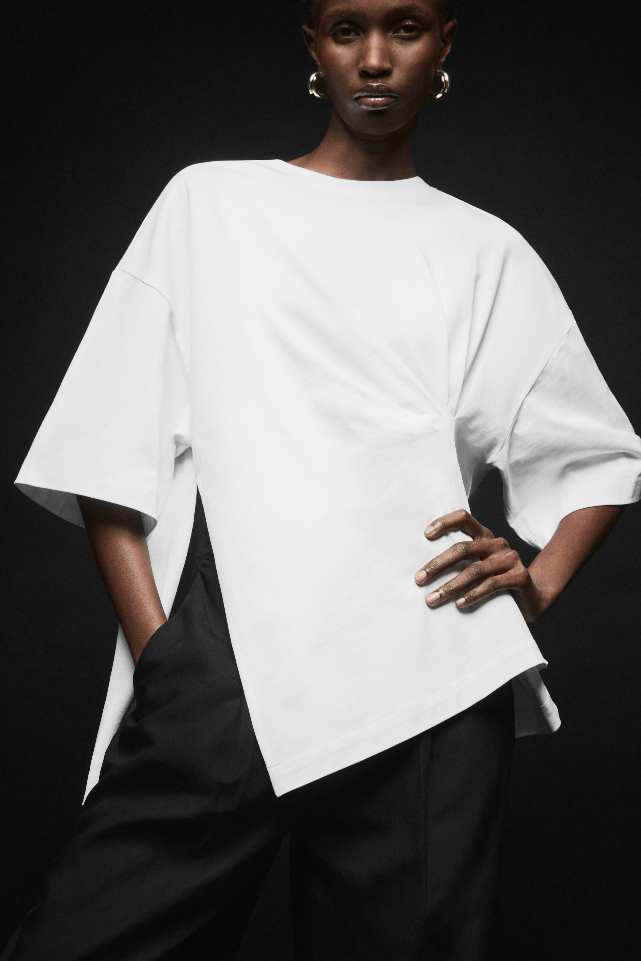 Woman wearing white top