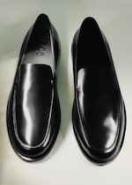 Placeholder for: black leather loafers