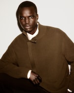 Placeholder for: Man in olive jacket