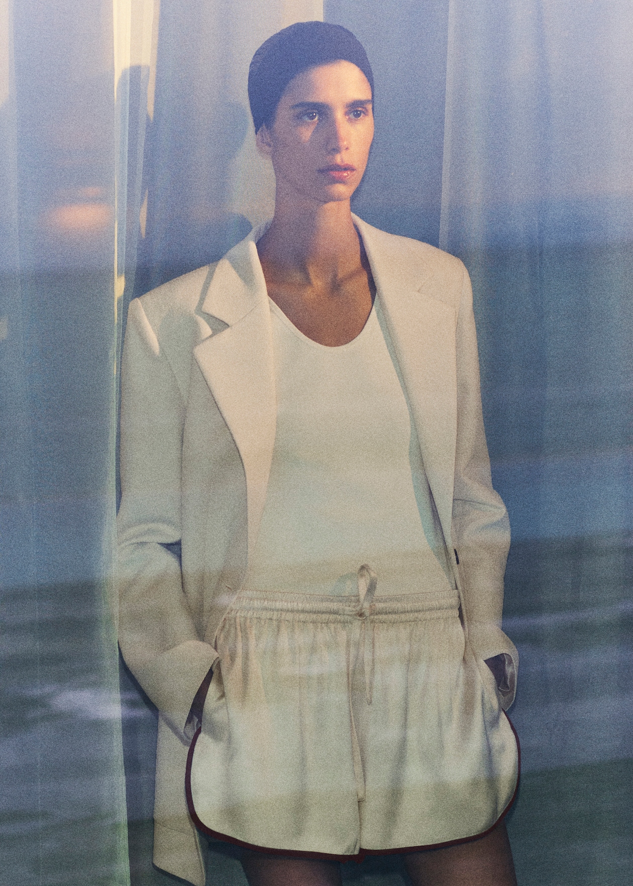 women in blazer and shorts
