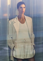 Placeholder for: women in blazer and shorts
