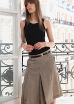 Placeholder for: women in check skirt and black vest top