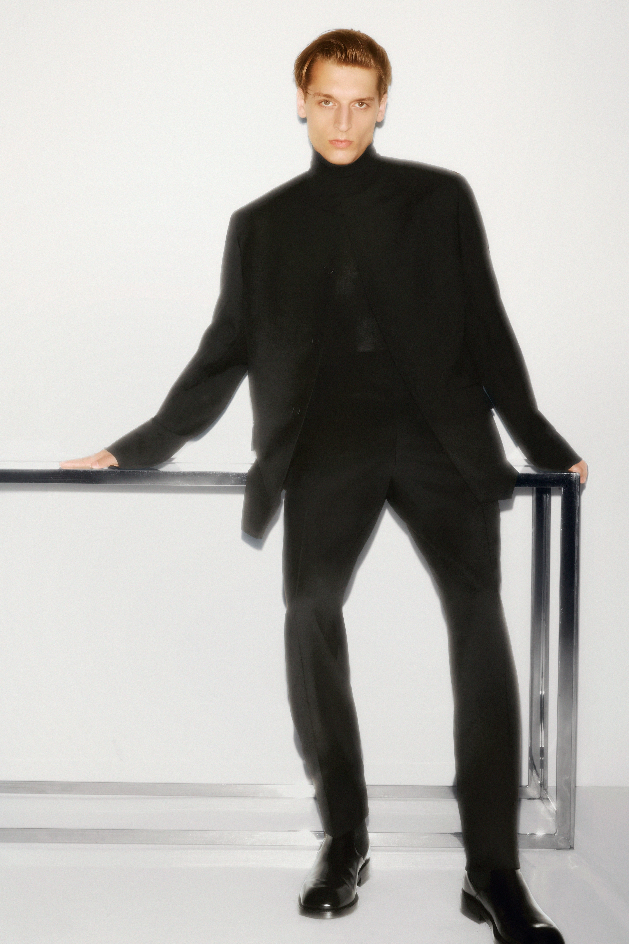 Man in wool suit and button up blazer