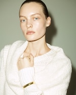 Placeholder for: model wearing white knitwear