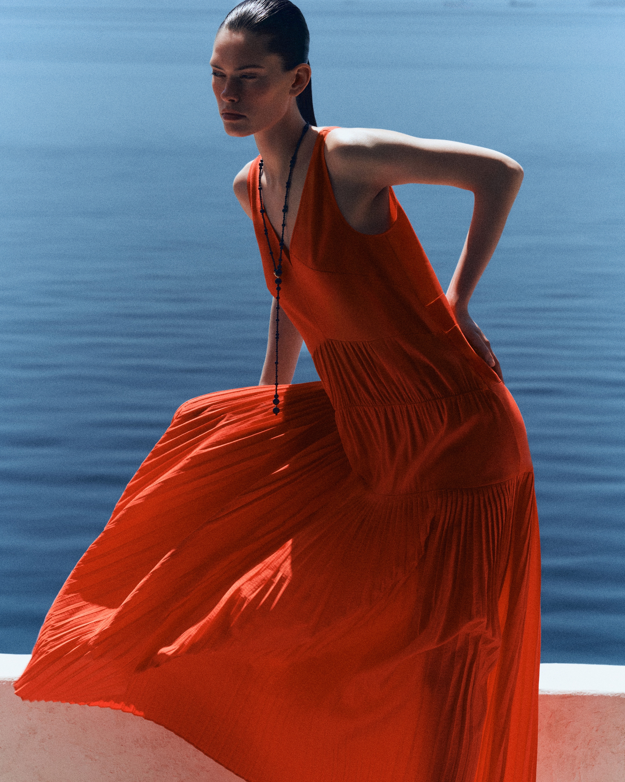 woman in orange dress