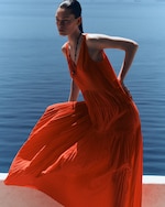 Placeholder for: woman in orange dress