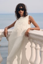 Placeholder for: woman in white dress