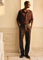 Placeholder for: man wearing brown trousers