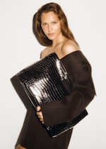Placeholder for: woman with bag
