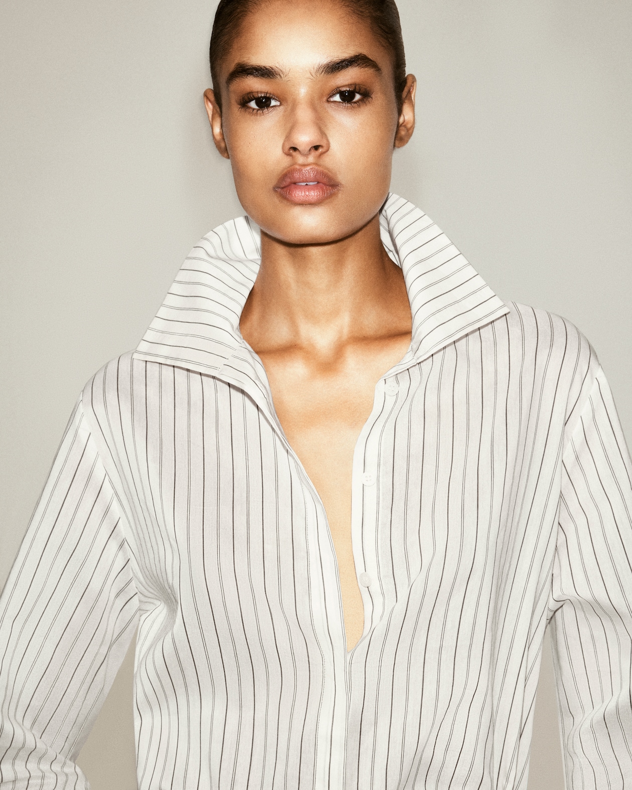 model in striped shirt
