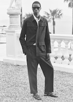 Placeholder for: man in safari co-ord suit