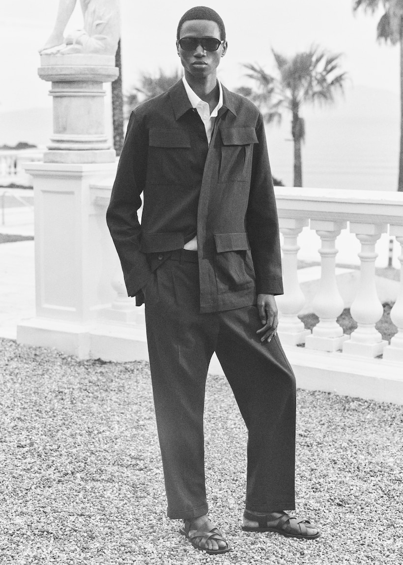 man in safari co-ord suit