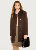 Placeholder for: woman in coat