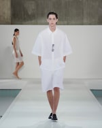 Placeholder for: white shirt and shorts