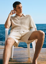 Placeholder for: knitted polo wearing man