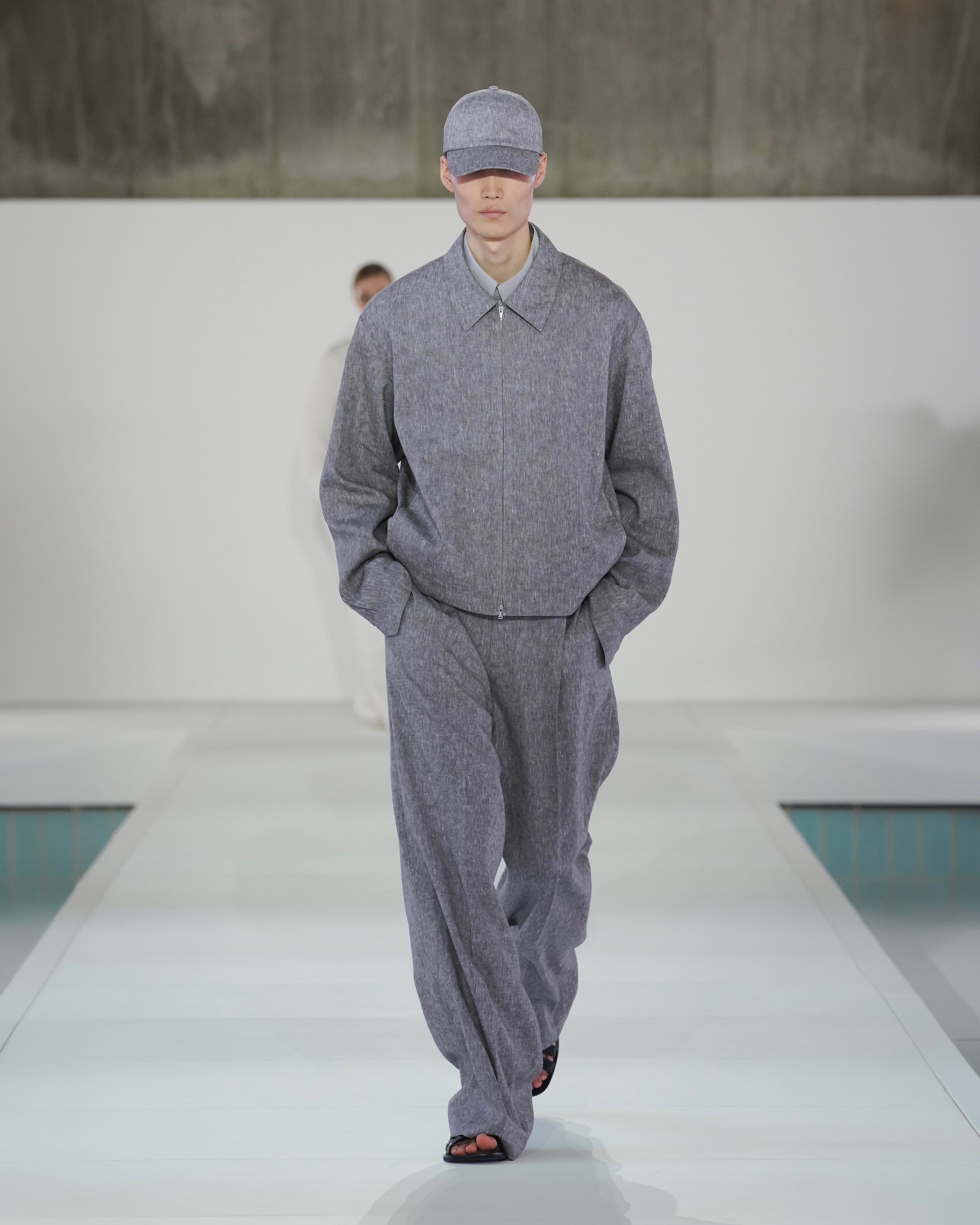 grey melange jacket and trousers and cap