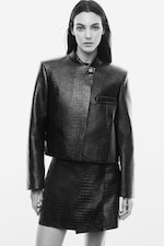 Placeholder for: model wearing leather jacket and skirt