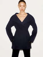 Placeholder for: women standing  in strong collared jacket