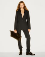Placeholder for: model wearing AW25 campaign womenswear