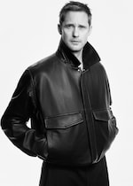 Placeholder for: alex wearing black leather jacket