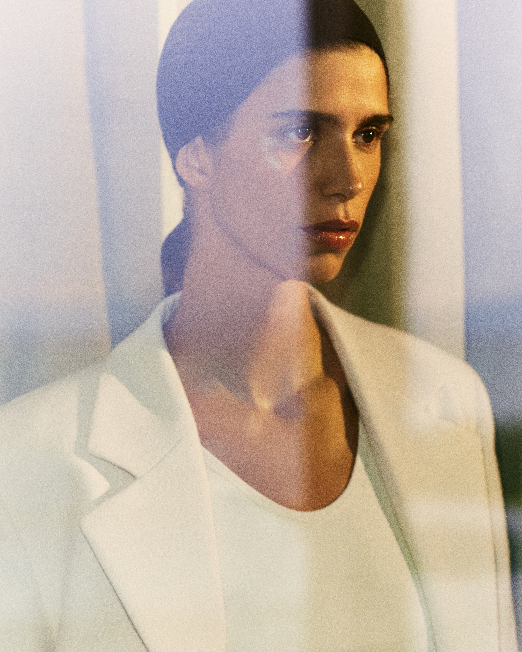 Person wearing white blazer