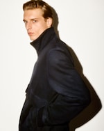Placeholder for: Man with black jacket