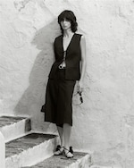 Placeholder for: woman in vest