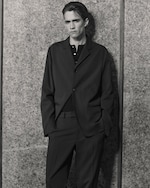 Placeholder for: man wearing black blazer