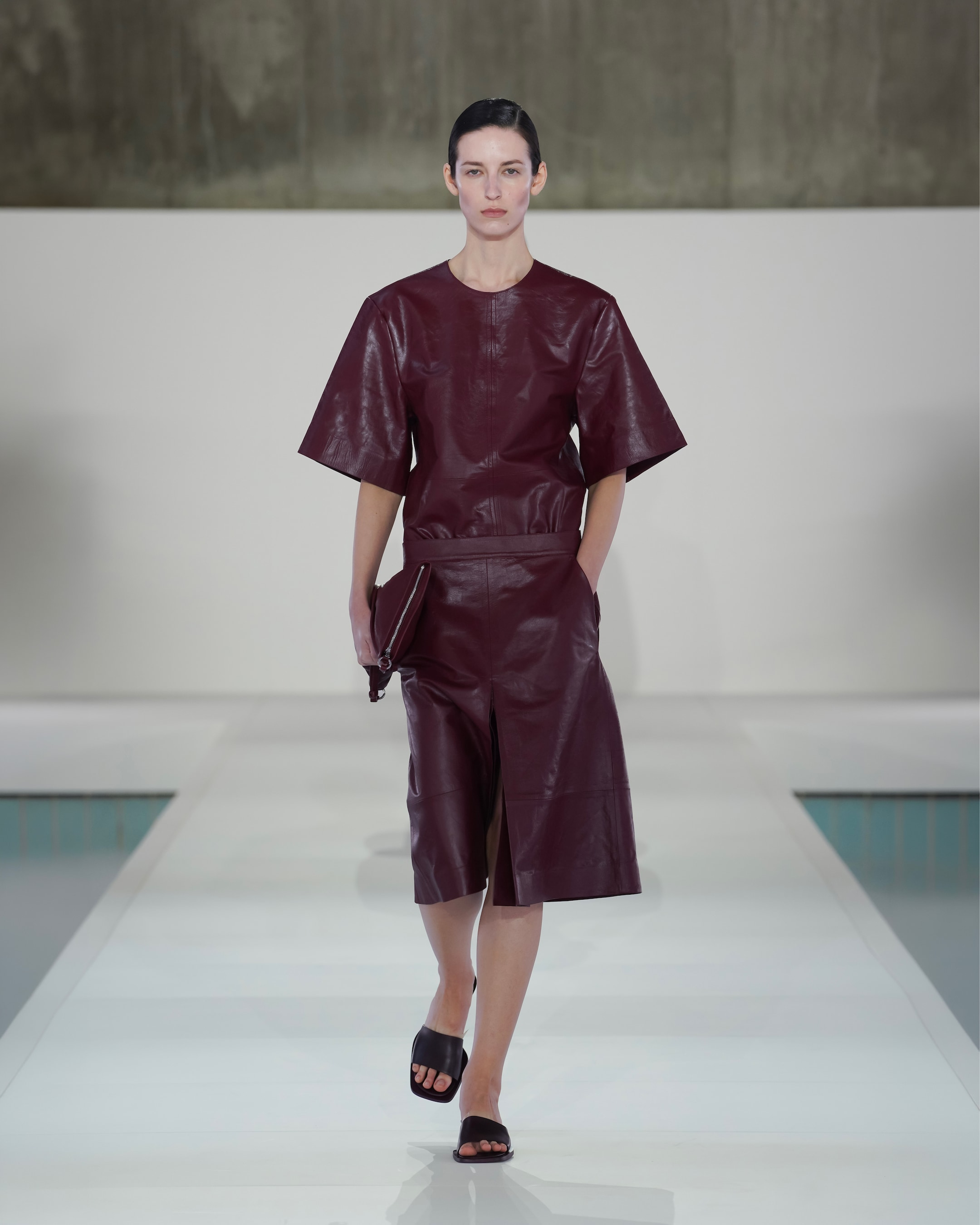 woman in red leather top and skirt