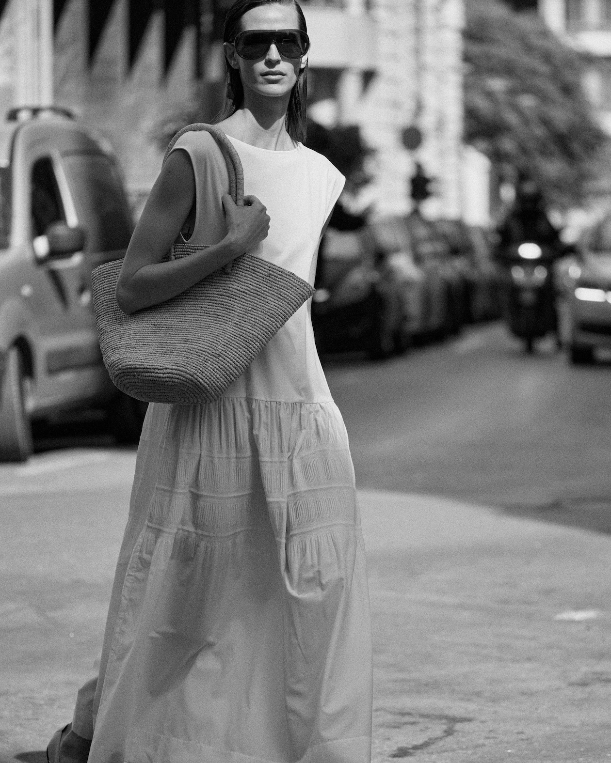 Women with straw tote bag