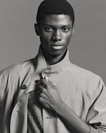 Placeholder for: black and white picture of a man wearing khaki blouson