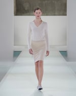 Placeholder for: woman in cashmere top and skirt