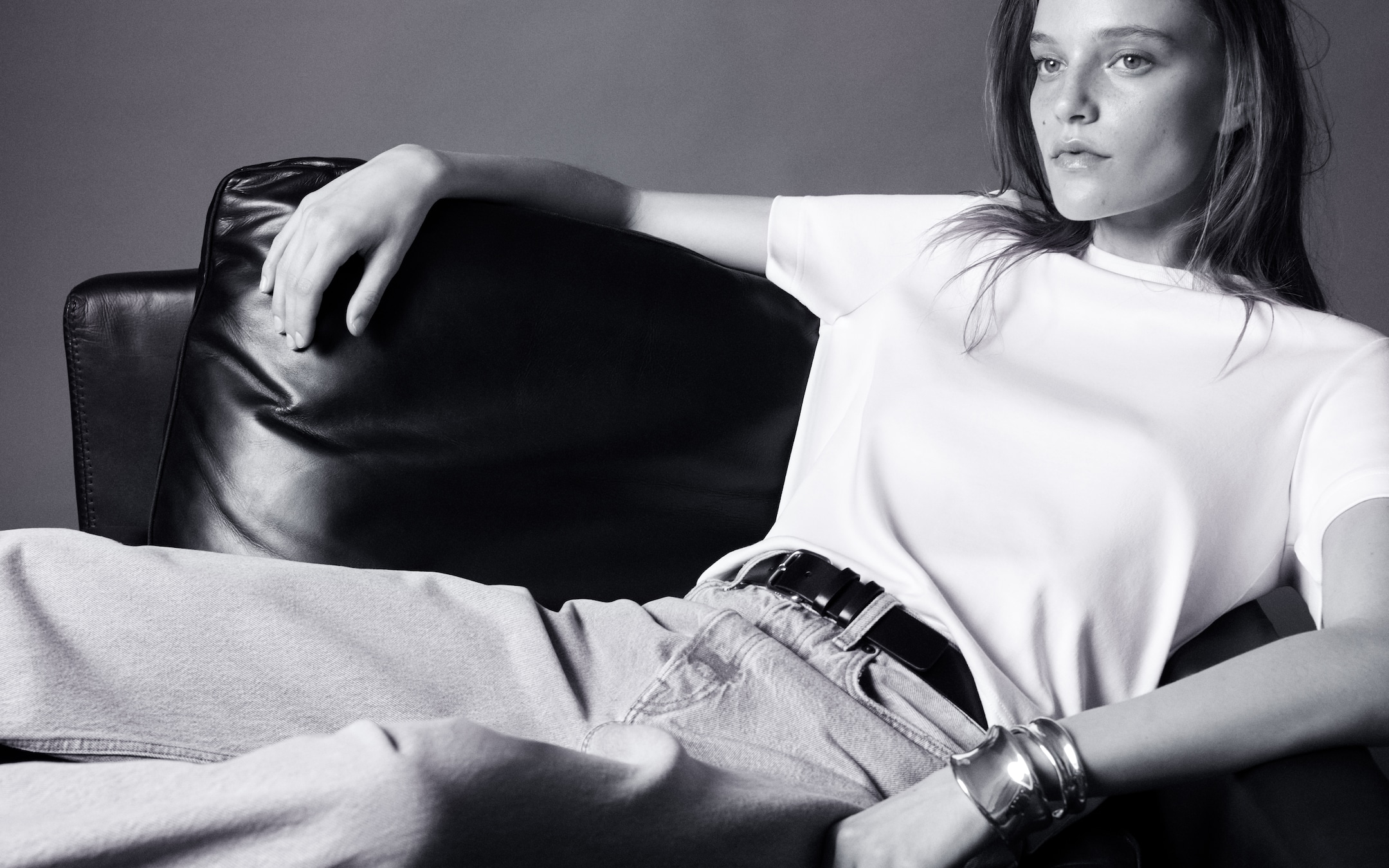 PERSON IN JEANS AND T-SHIRT