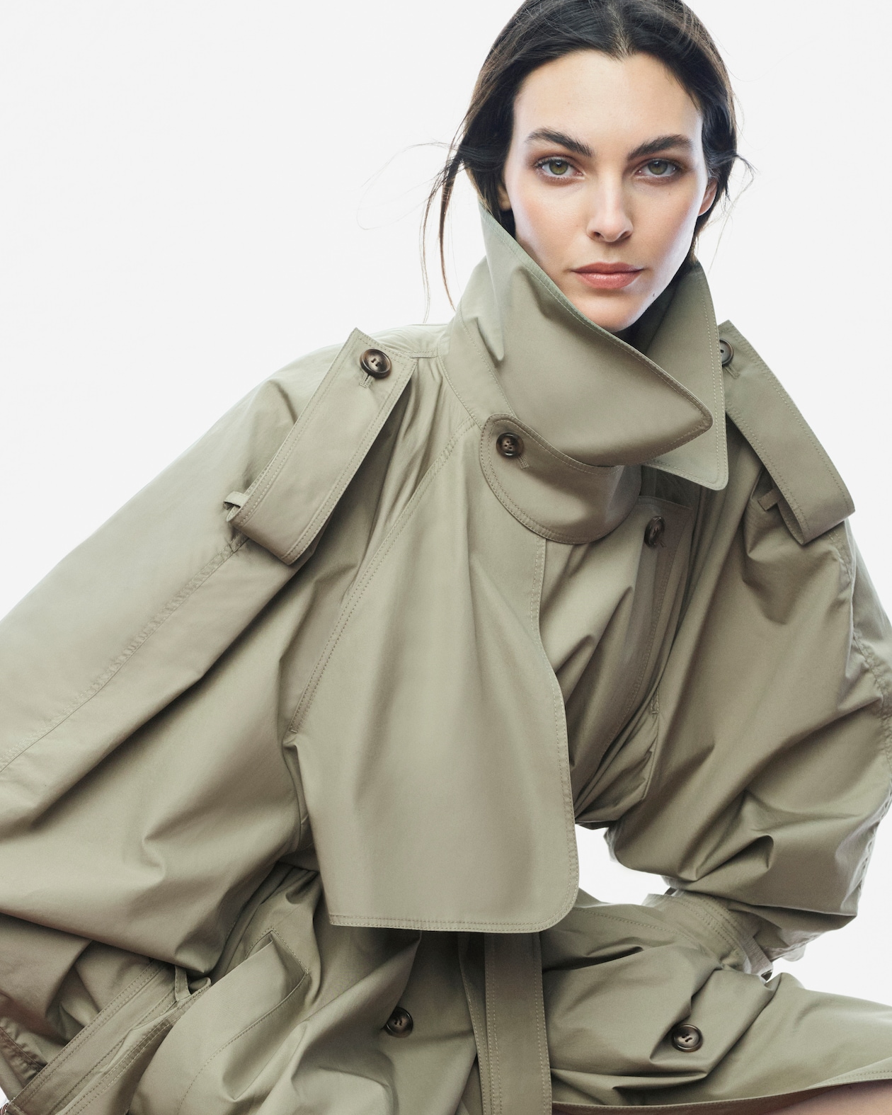 person wearing trench coat